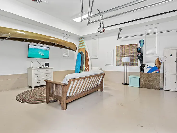 The garage with canoe and paddleboards